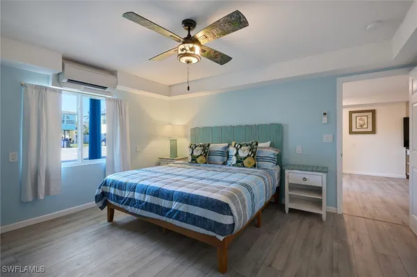 a bathroom with double sink and a mirror