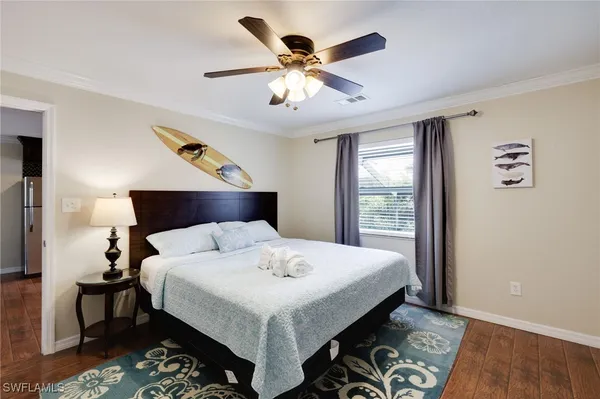 a view of a chairs and table in a balcony