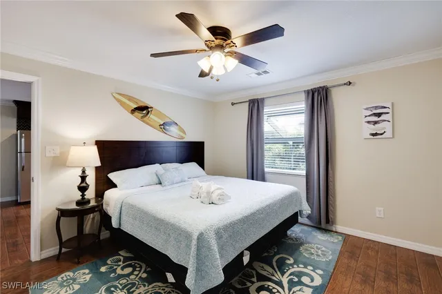 a view of a chairs and table in a balcony