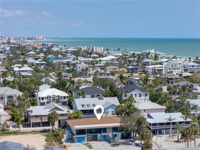 an aerial view of a house with a outdoor space