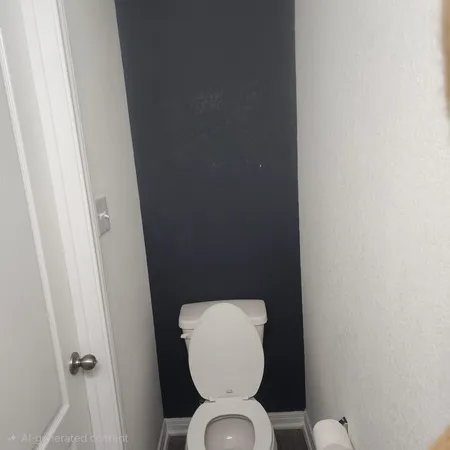 a bathroom with a toilet
