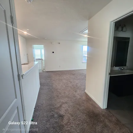 a view of a hallway view with staircase