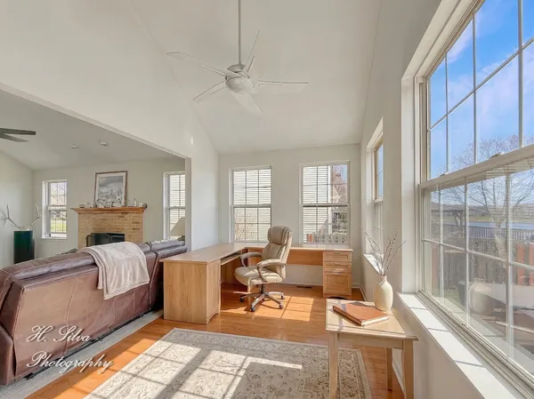 a bed room with a bed and glass door
