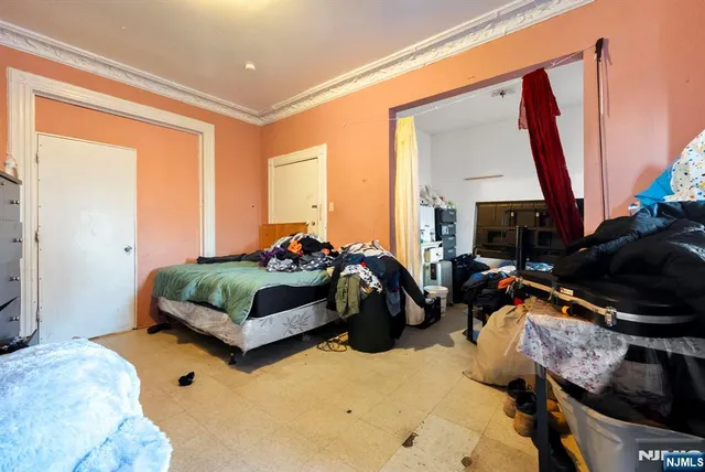 a bed room with a bed and a fish tank