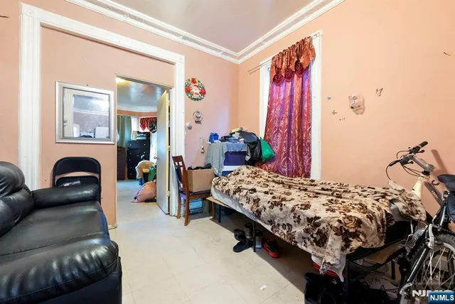 a living room filled with furniture and furniture