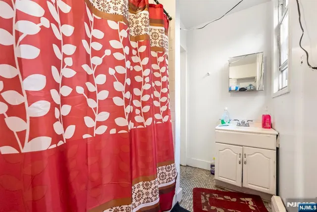 a view of a backyard with a sitting area