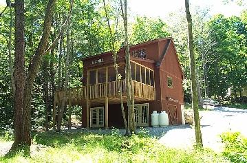 138 Gibbs Road Otis, MA 01253 - Photo 2 of 2 a view of a house with a yard