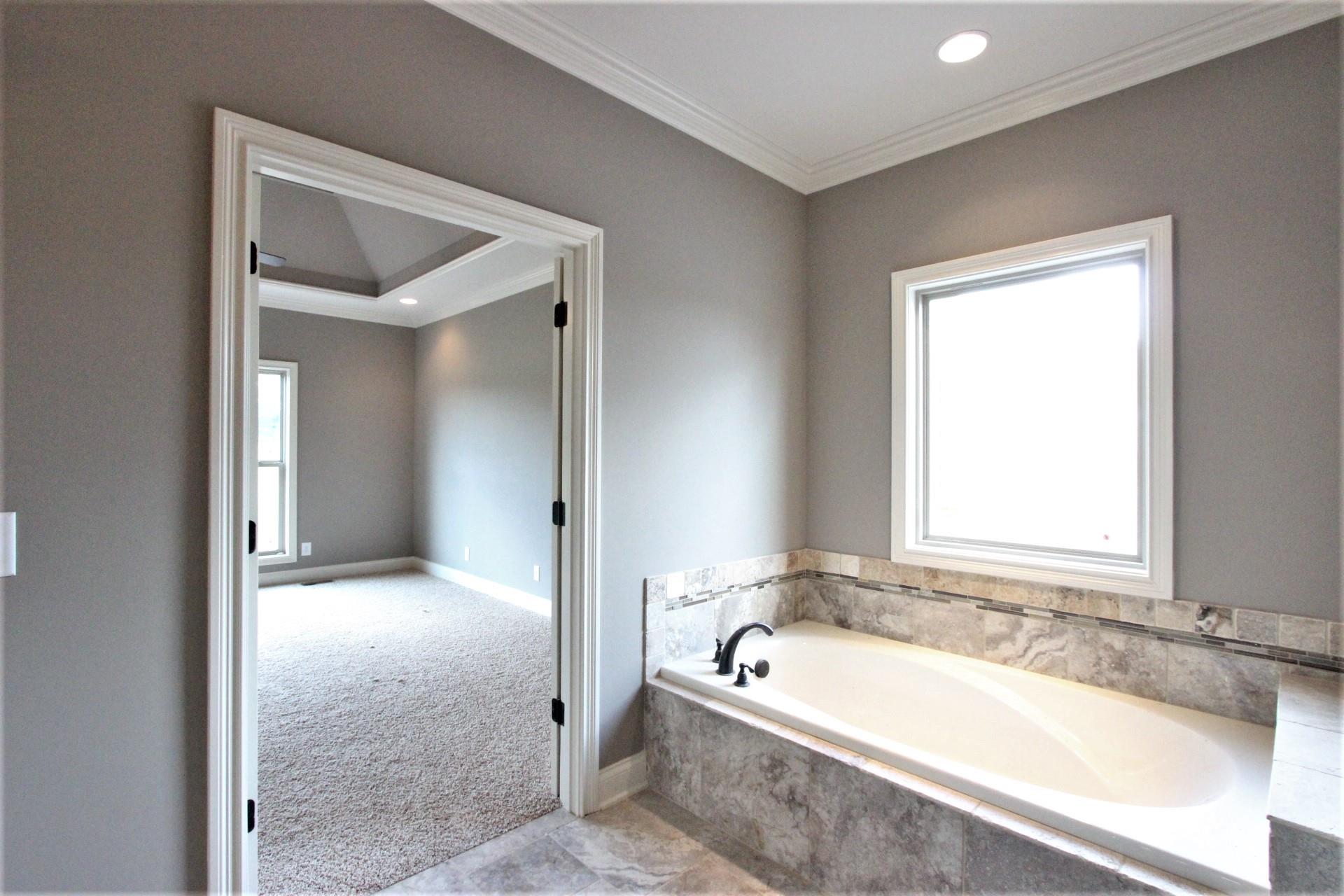 807 Philadelphia Road, Unit 3 Lebanon, TN 37087 - Photo 19 of 23 a bathroom with a bathtub and a sink