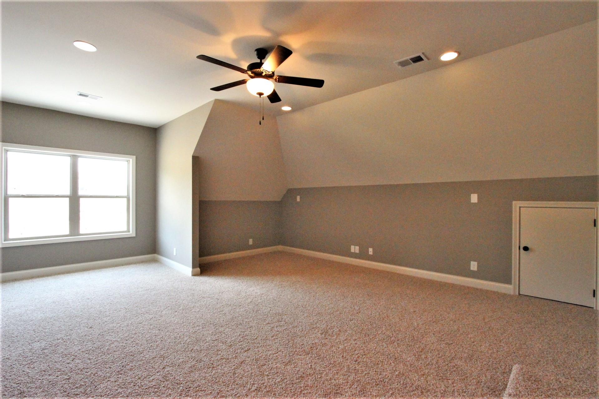 807 Philadelphia Road, Unit 3 Lebanon, TN 37087 - Photo 21 of 23 a view of an empty room with a window