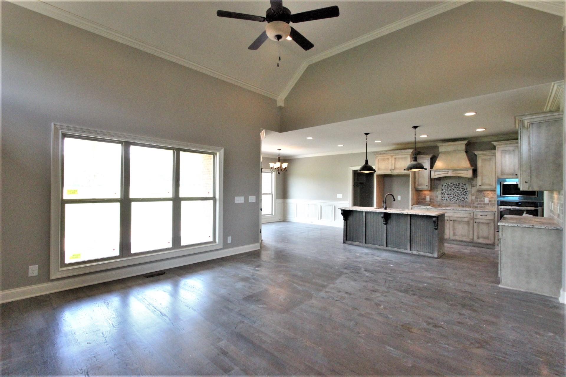 807 Philadelphia Road, Unit 3 Lebanon, TN 37087 - Photo 9 of 23 a view of kitchen with windows and ceiling fan