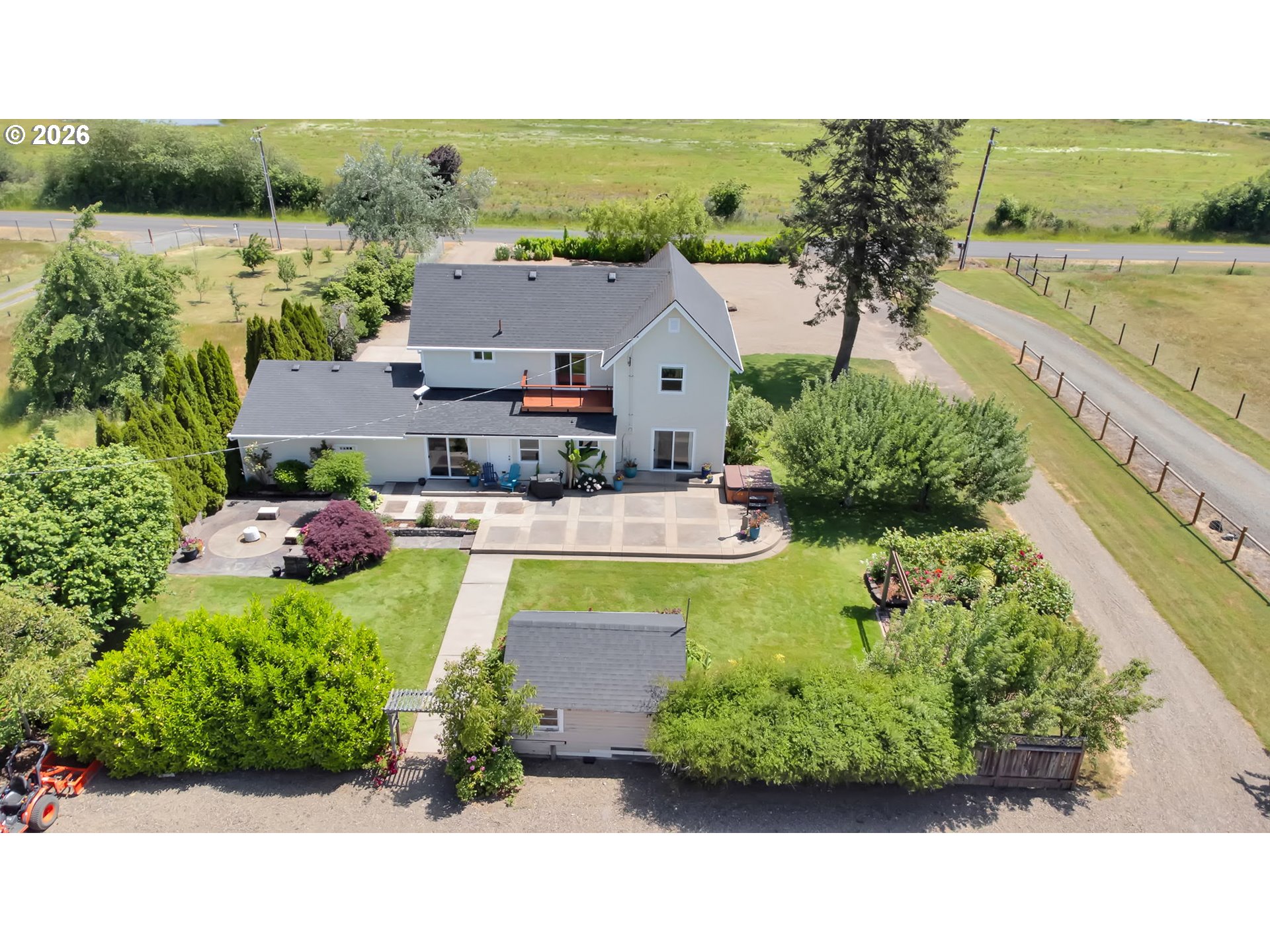 90440 Goodman Road Junction City, OR 97448 - Photo 46 of 48 an aerial view of a house with a garden and lake view