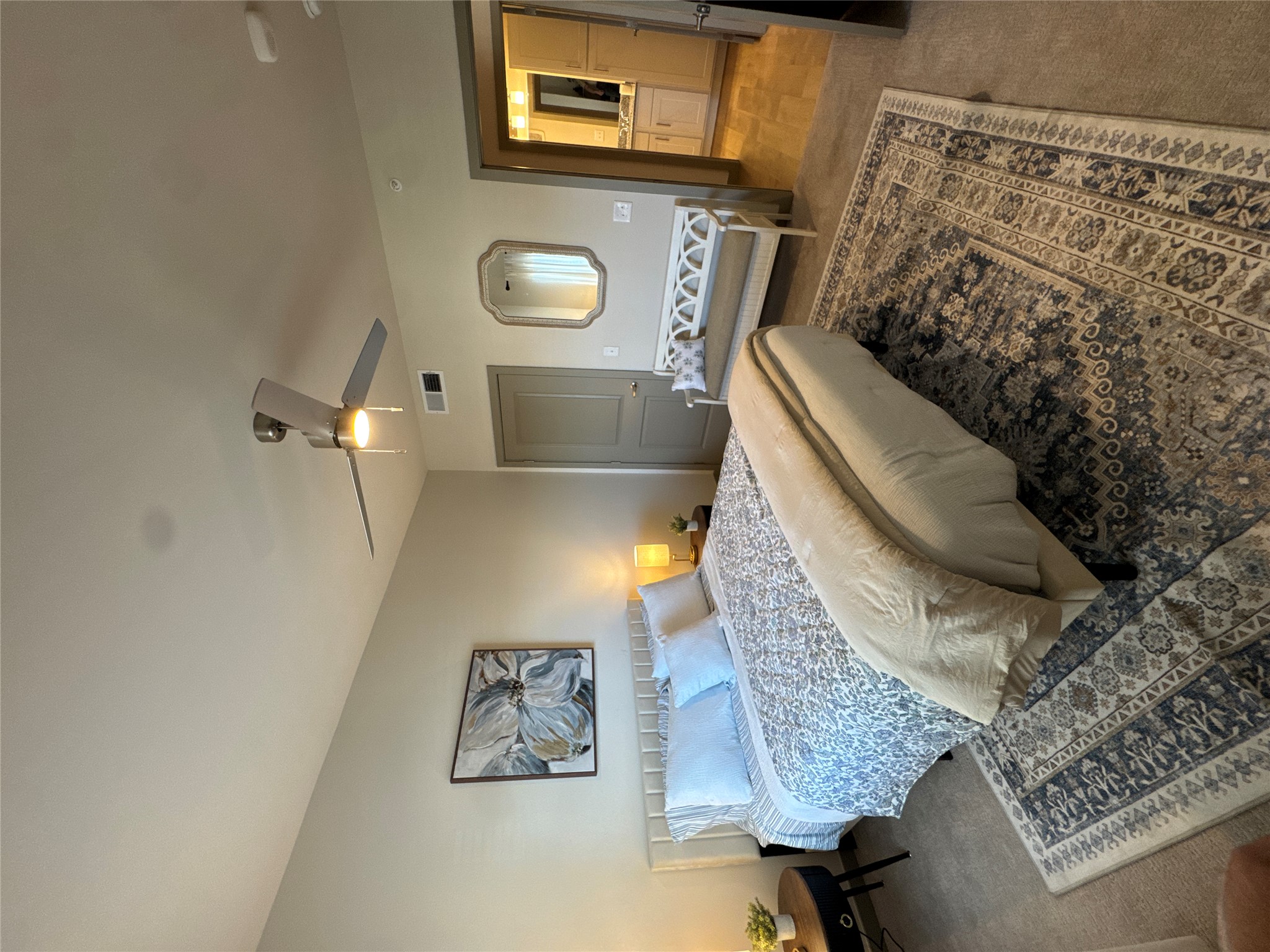 691 Union Chapel Road, Unit A1 Cedar Creek, TX 78612 - Photo 12 of 14 a spacious bedroom with a bed and dresser