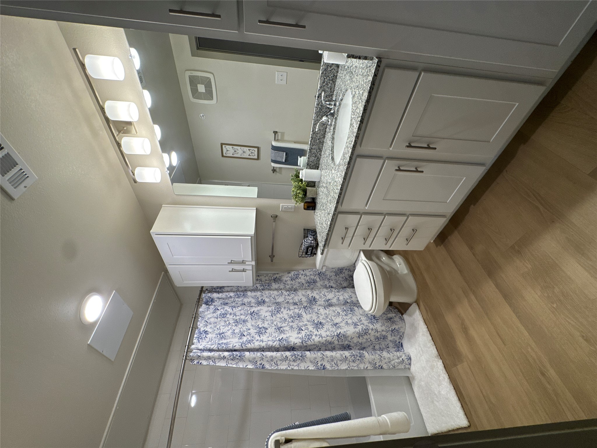 691 Union Chapel Road, Unit A1 Cedar Creek, TX 78612 - Photo 7 of 14 a bathroom with a double vanity sink toilet and shower