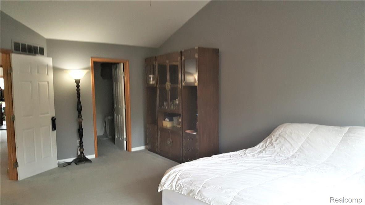 27830 Reo Road Grosse Ile, MI 48138 - Photo 23 of 31 Master bedroom with walk-in closet.