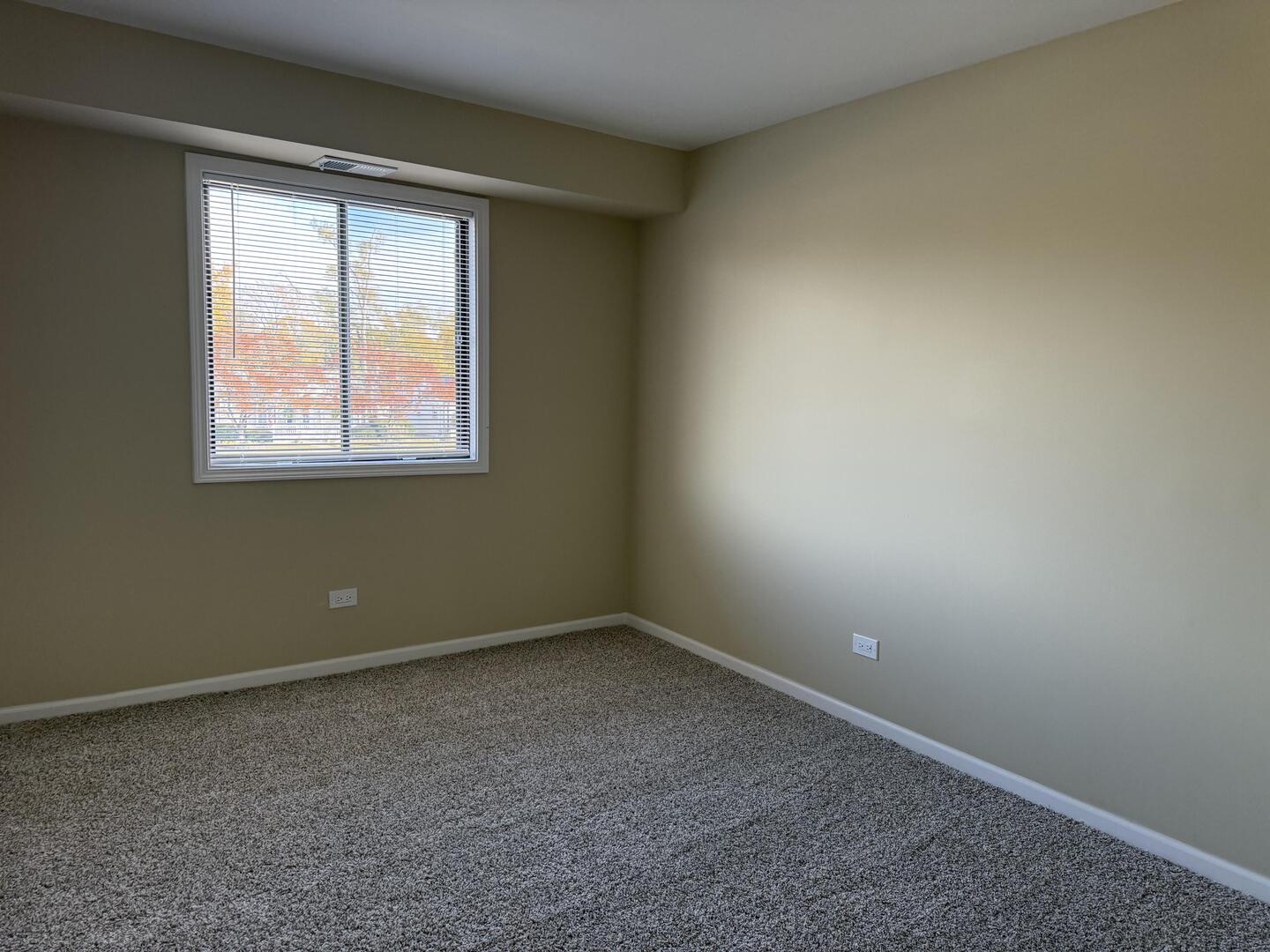14970 Pulaski Road, Unit 5 Midlothian, IL 60445 - Photo 12 of 22 an empty room with a window