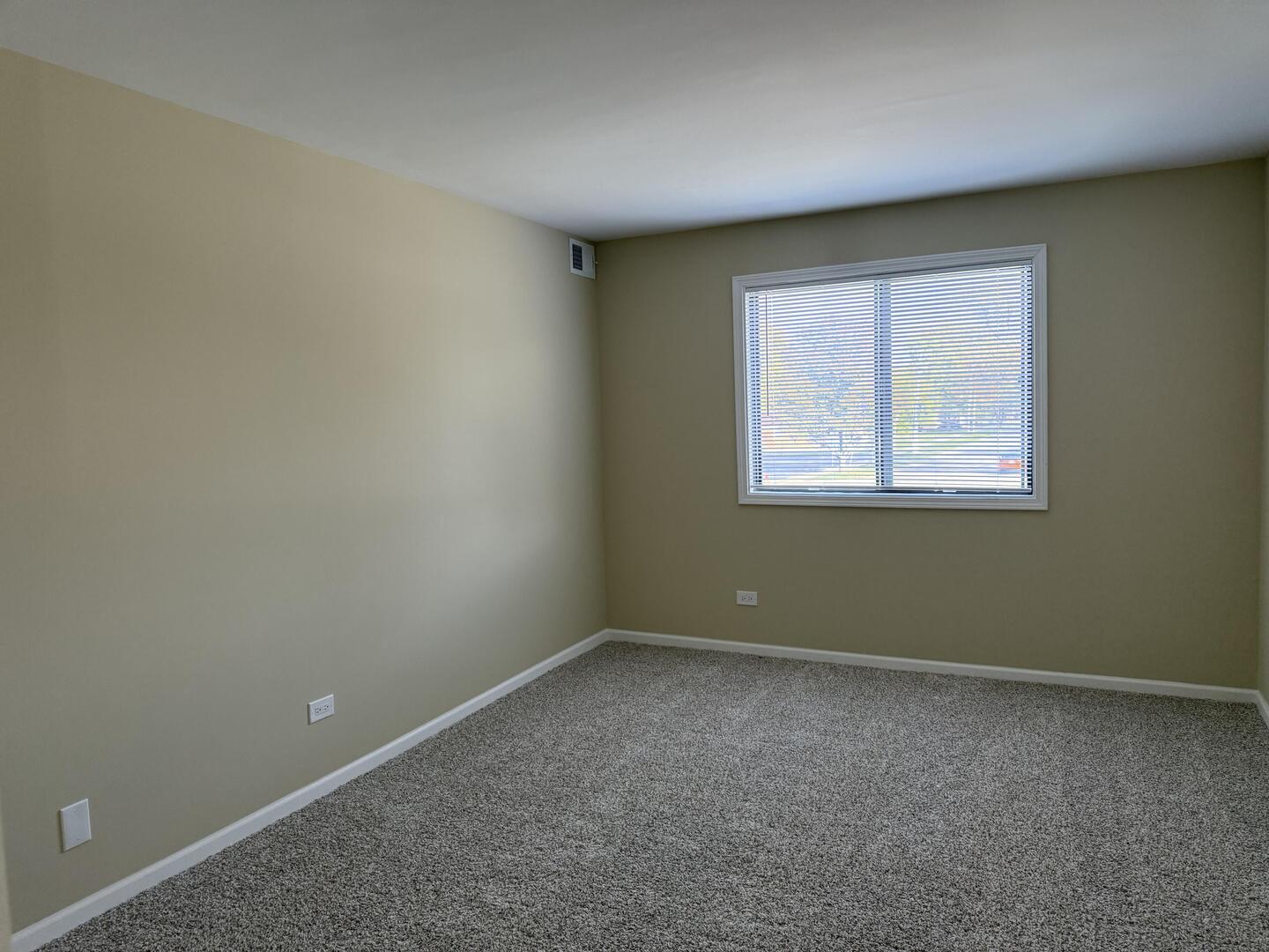 14970 Pulaski Road, Unit 5 Midlothian, IL 60445 - Photo 16 of 22 an empty room with a window