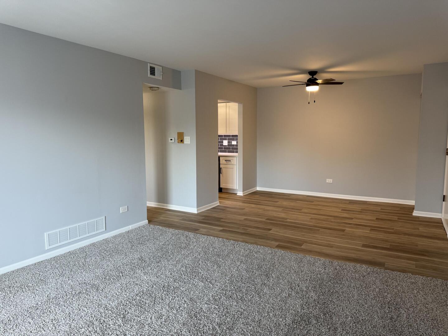 14970 Pulaski Road, Unit 5 Midlothian, IL 60445 - Photo 3 of 22 a view of empty room with wooden floor