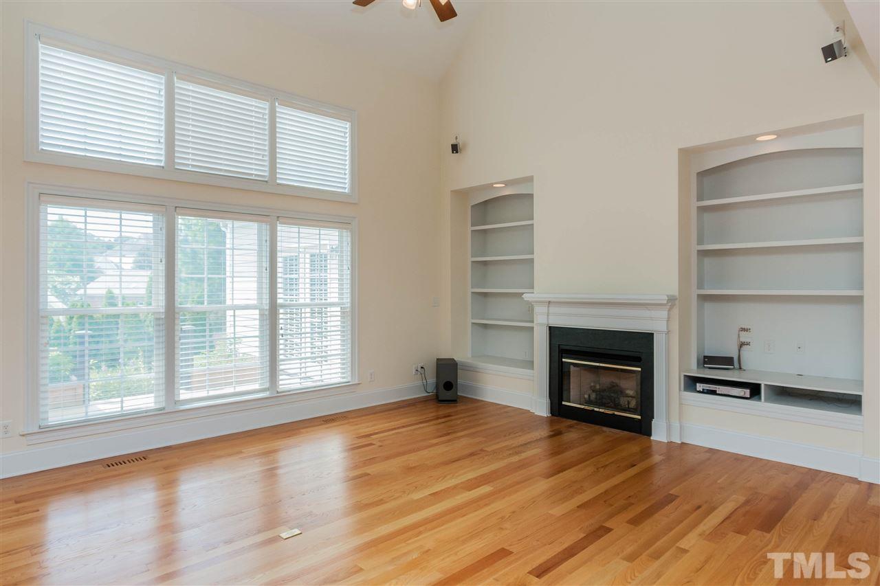 1817 Stannard Trail Raleigh, NC 27612 - Photo 3 of 25 Custom Built-ins are a nice addition to this Great Room.