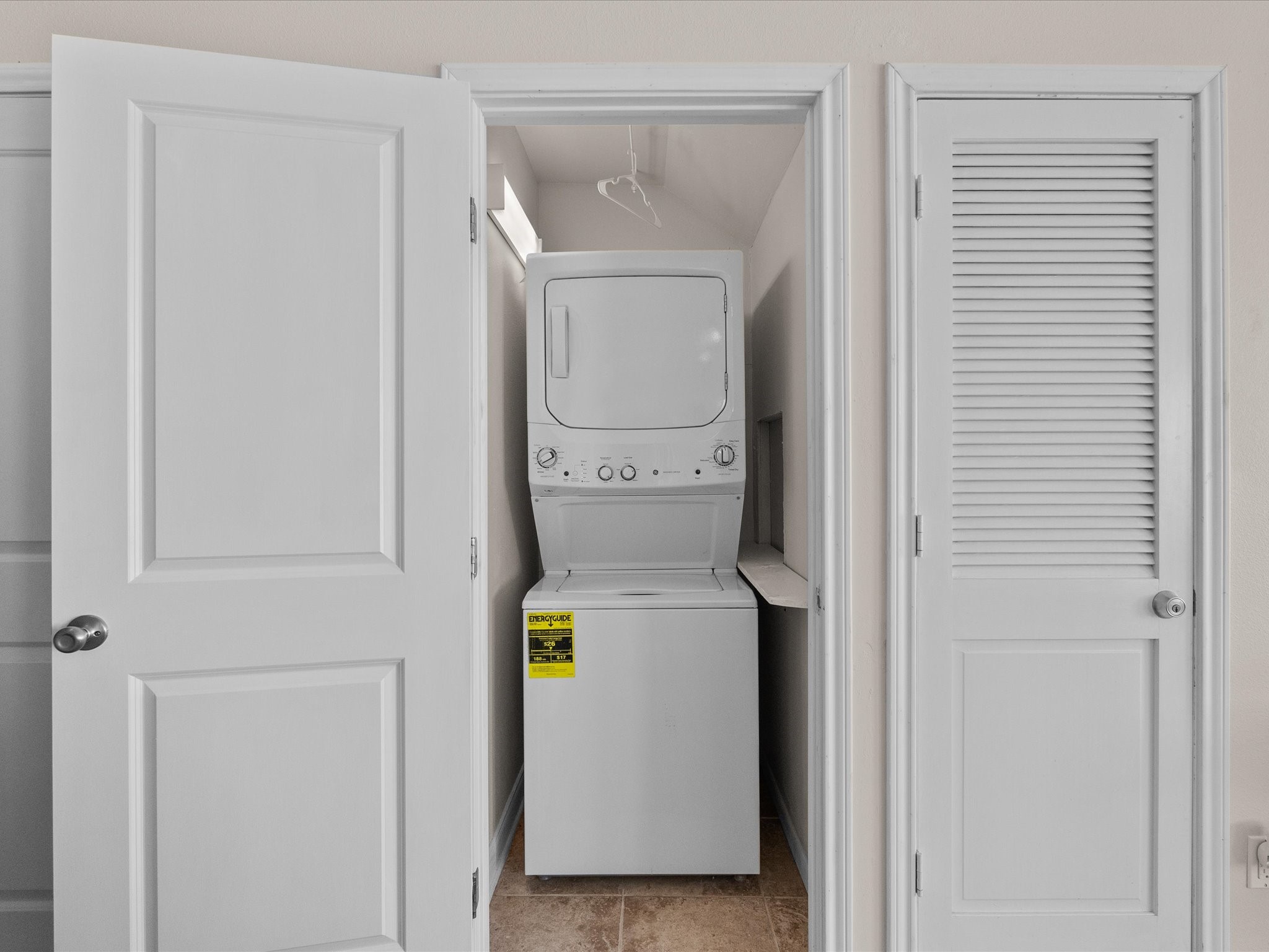 111 Beach Drive Surfside Beach, TX 77541 - Photo 15 of 31 a utility room with dryer and washer