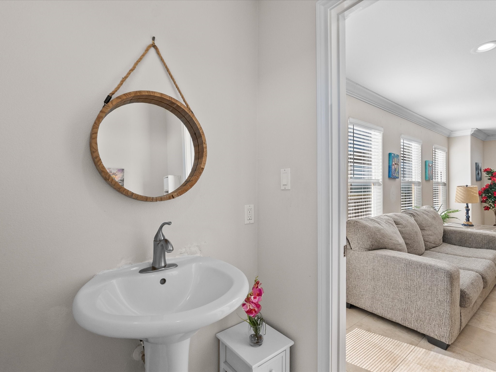 111 Beach Drive Surfside Beach, TX 77541 - Photo 31 of 31 a living room with furniture and a mirror