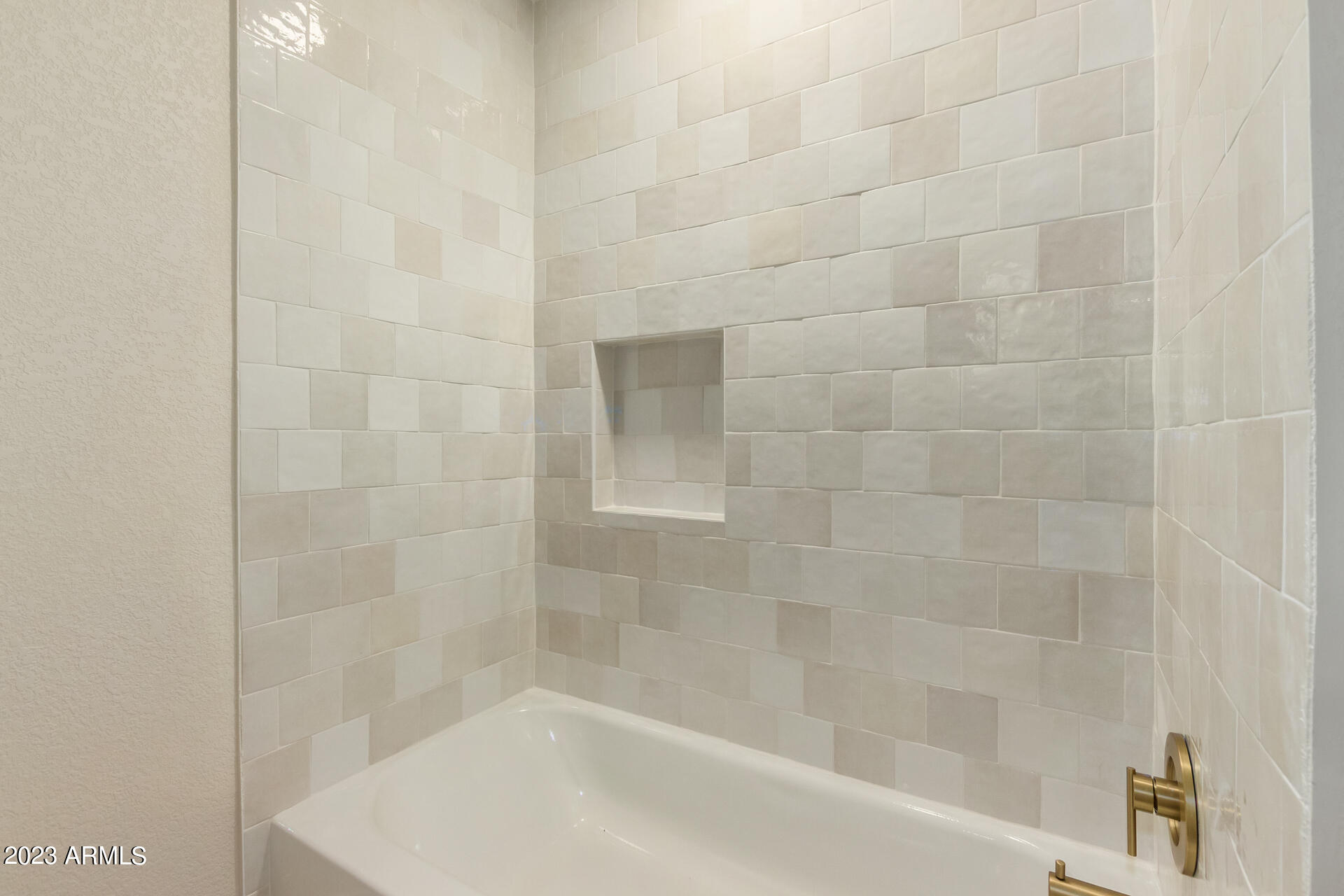 5028 East Decatur Street Mesa, AZ 85205 - Photo 32 of 42 a close up of a bathtub curtain