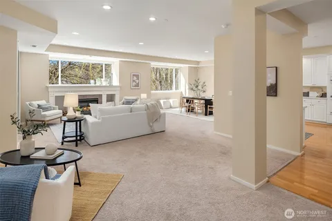 a view of a livingroom with furniture and a window