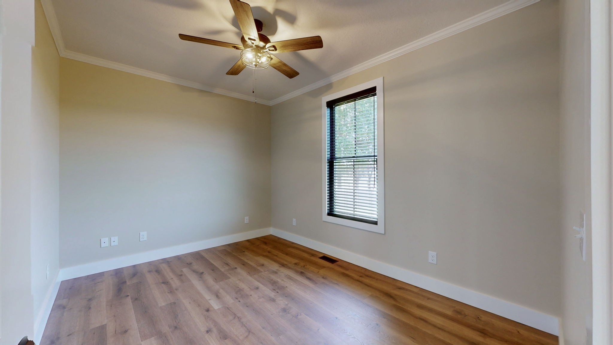 865 Alman Cemetery Road Paris, TN 38242 - Photo 26 of 41 wooden floor in an empty room with a window