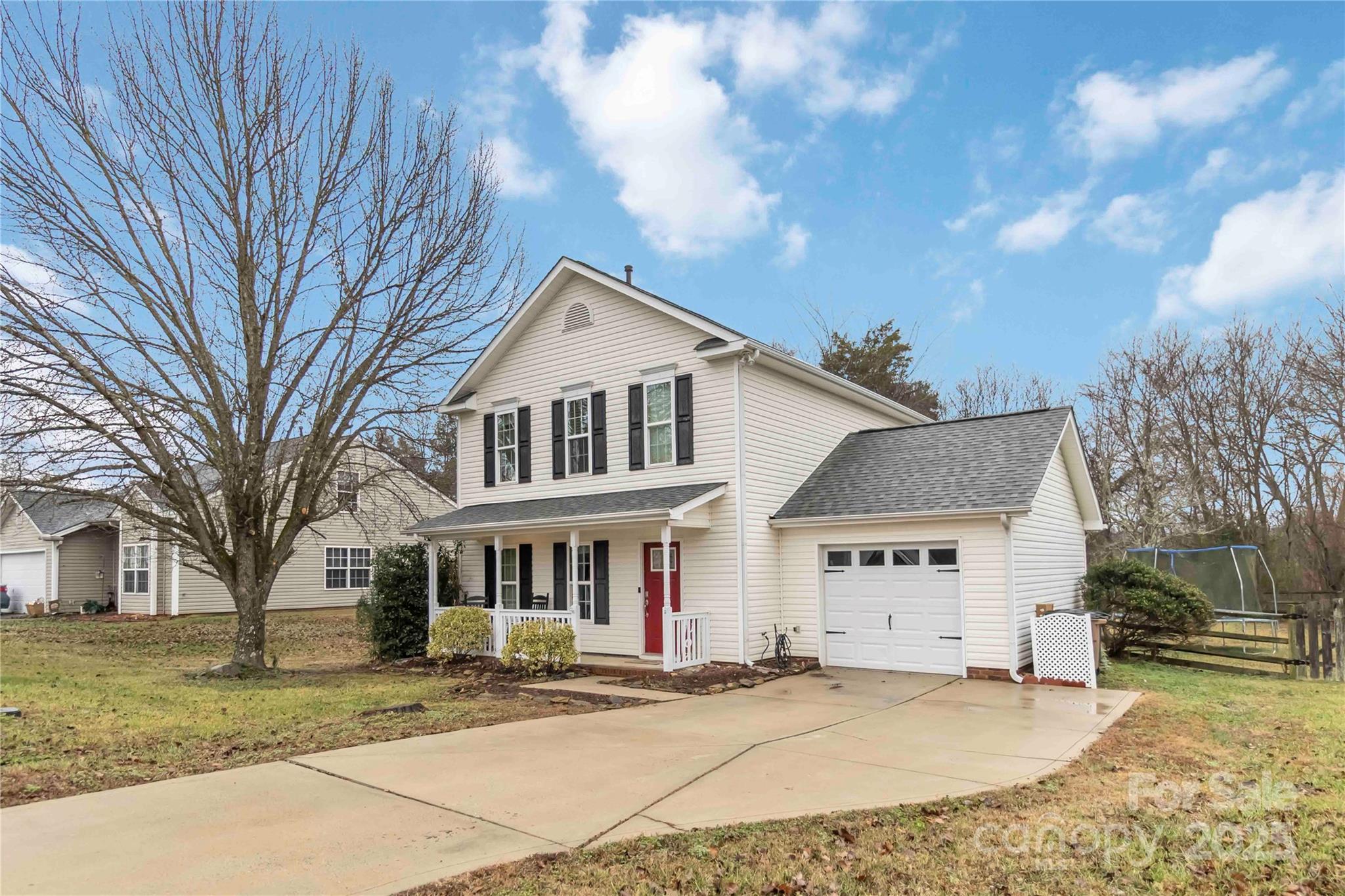 2127 Genesis Drive Monroe, NC 28110 - Photo 2 of 17 a front view of a house with a yard