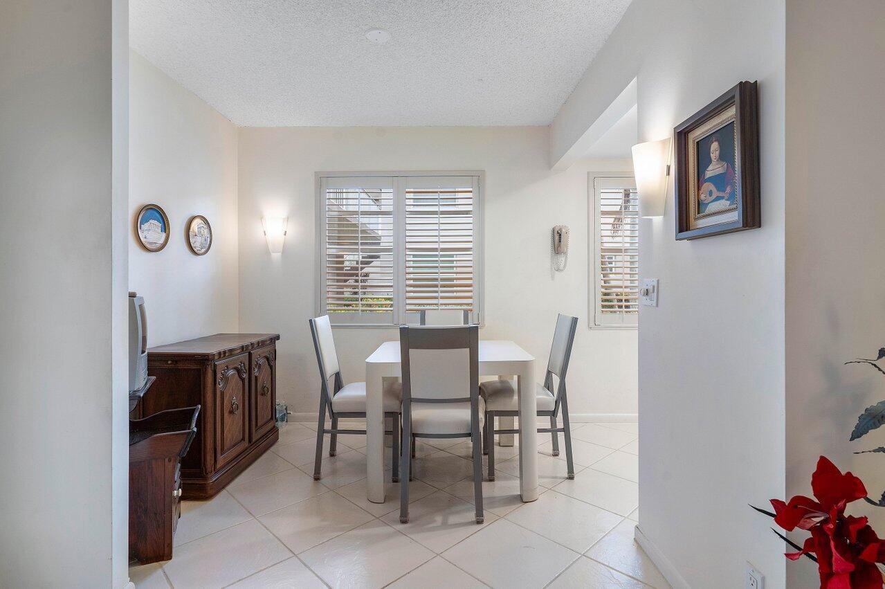 637 Normandy Lane, Unit N Delray Beach, FL 33484 - Photo 5 of 28 DINING AREA