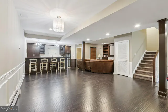 a room with furniture and wooden floor
