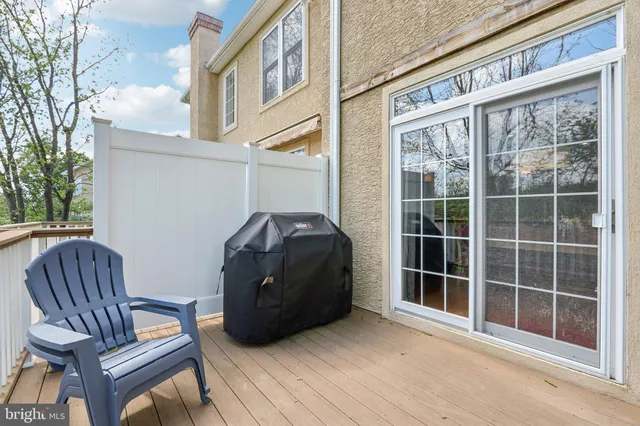 a view of a brick house with a small window