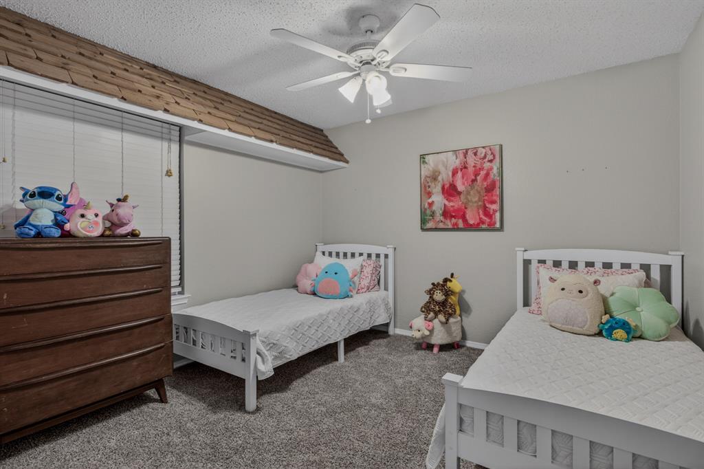 2864 Deer Ridge Drive Rockwall, TX 75032 - Photo 27 of 39 Secondary bedroom
