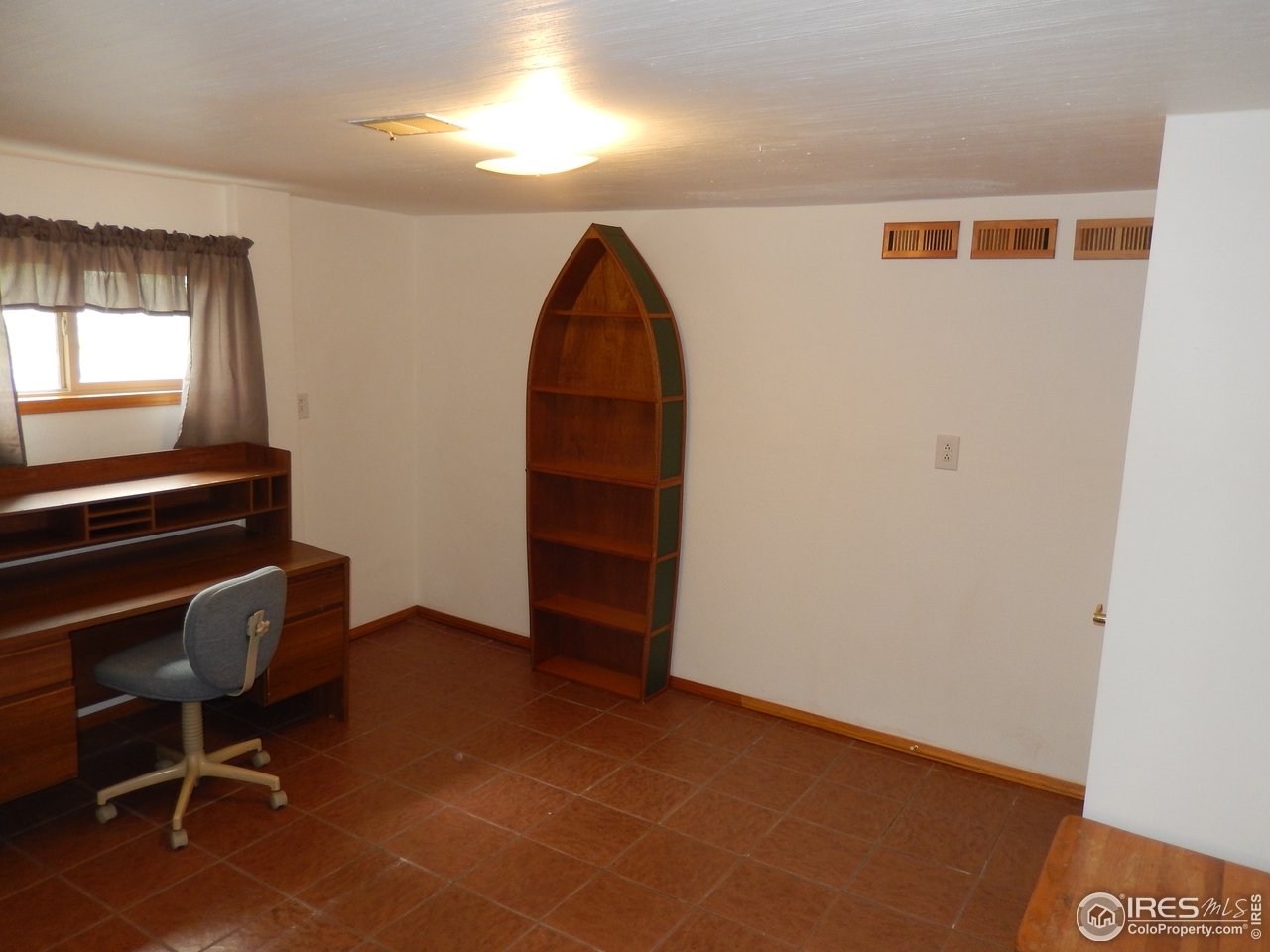 13730 Elmore Road Longmont, CO 80504 - Photo 11 of 25 Downstairs room