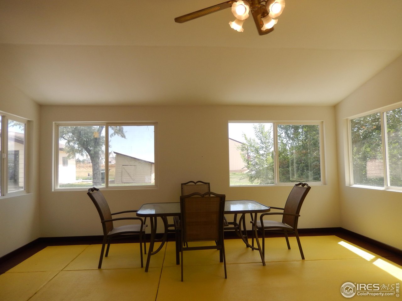 13730 Elmore Road Longmont, CO 80504 - Photo 16 of 25 Sun room