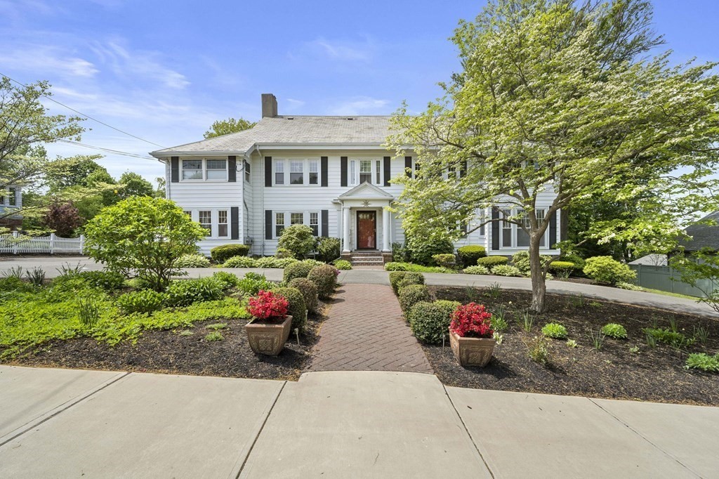 a view of a house with a garden