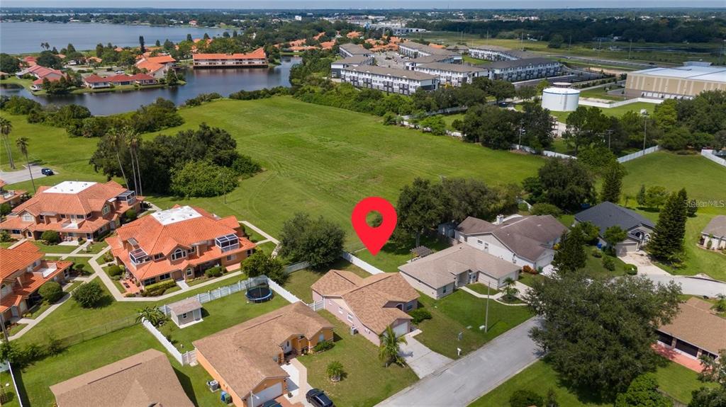 871 Reflections Loop East Winter Haven, FL 33884 - Photo 19 of 23 an aerial view of a houses and an outdoor space