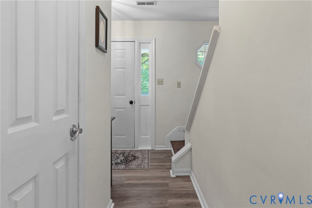 5010 Tatum Road Disputanta, VA 23842 - Photo 8 of 50 Entryway featuring wood-finish flooring, a paneled