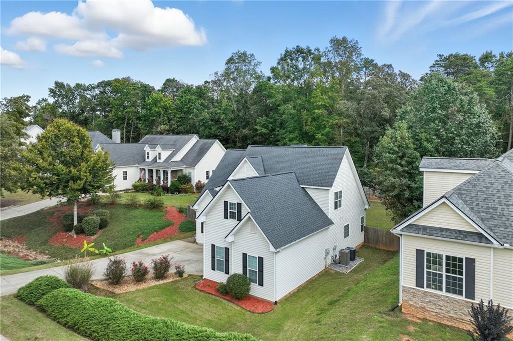 4260 Mountain Ridge Road Gainesville, GA 30506 - Photo 3 of 39 an aerial view of a house with swimming pool garden and patio