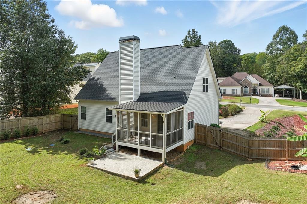 4260 Mountain Ridge Road Gainesville, GA 30506 - Photo 39 of 39 a view of a house with backyard and porch