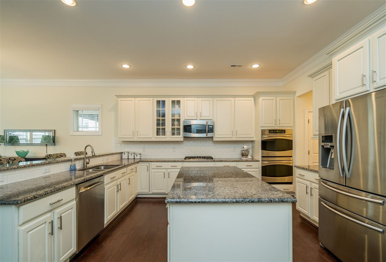 5616 Wade Park Boulevard Raleigh, NC 27607 - Photo 9 of 30 This beautiful kitchen opens up to breakfast room and family room for an open and spacious feel downstairs! Kitchen