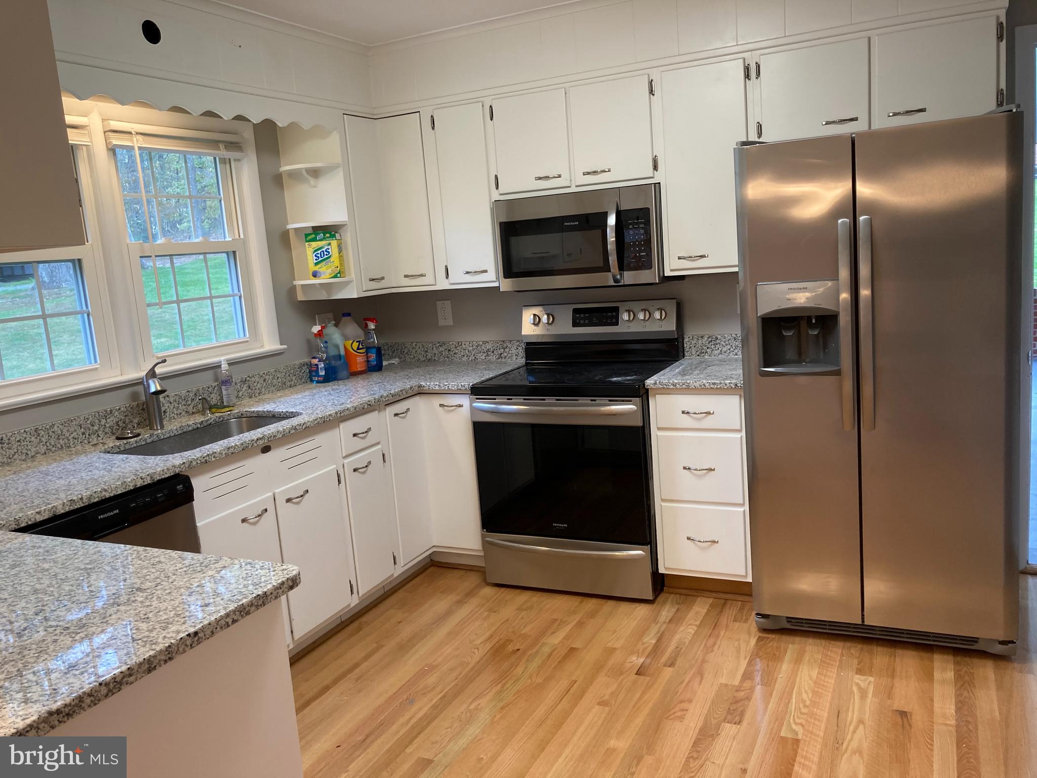Kitchen with new granite counters and appliances