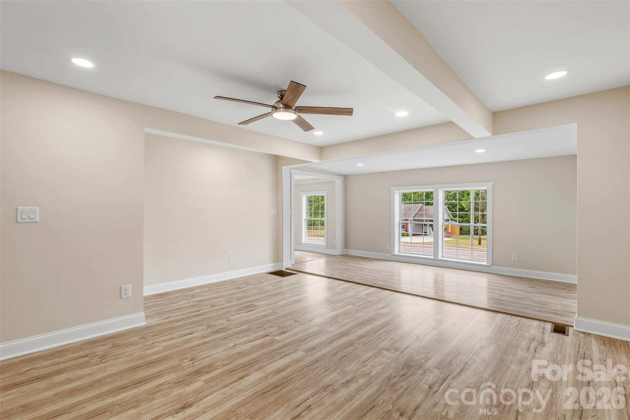 2480 Artz Road Salisbury, NC 28146 - Photo 13 of 33 an empty room with wooden floor and windows