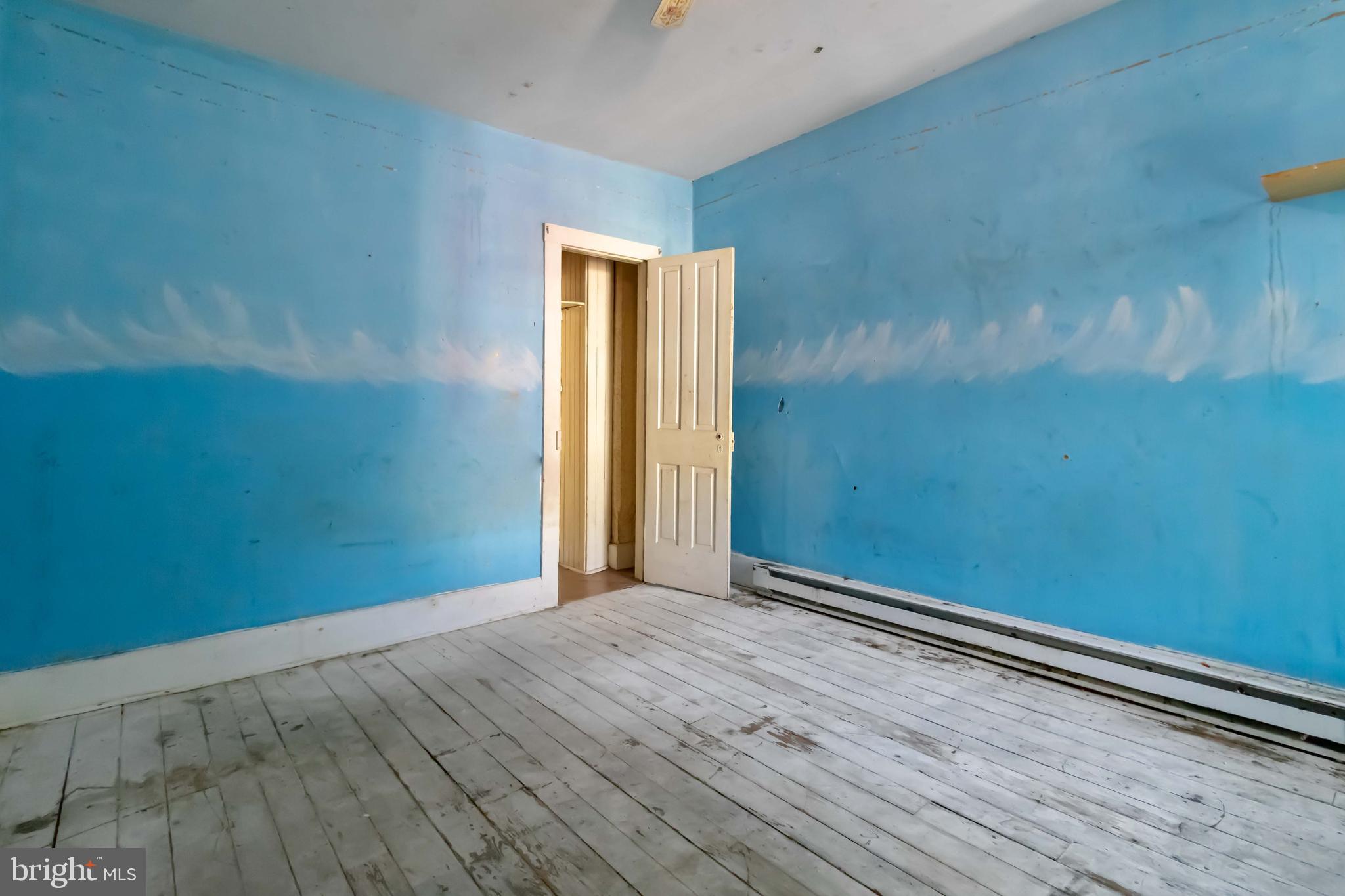 11 West Commerce Street Shamokin, PA 17872 - Photo 16 of 24 a view of empty room with wooden floor