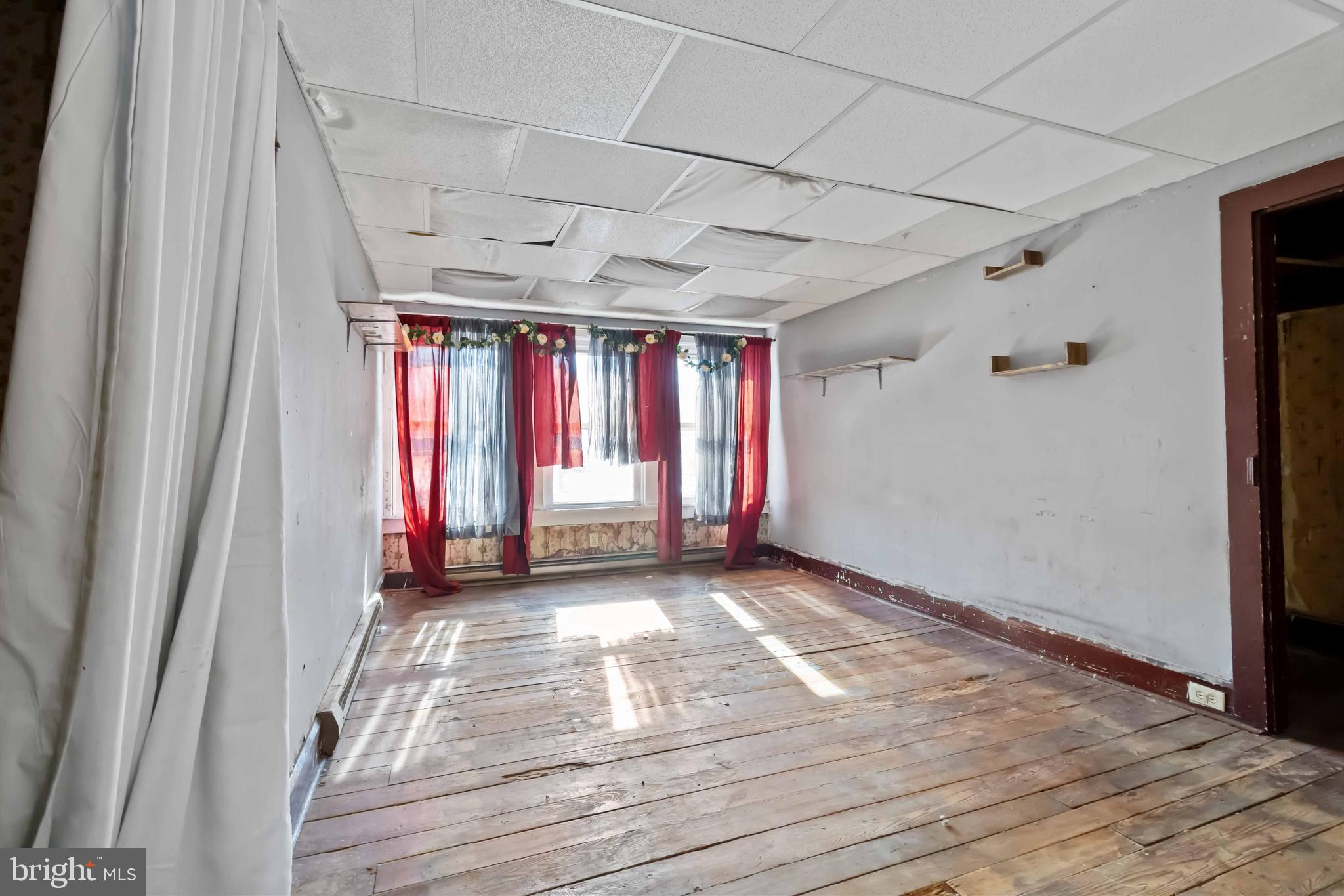 11 West Commerce Street Shamokin, PA 17872 - Photo 20 of 24 a view of an empty room with a window