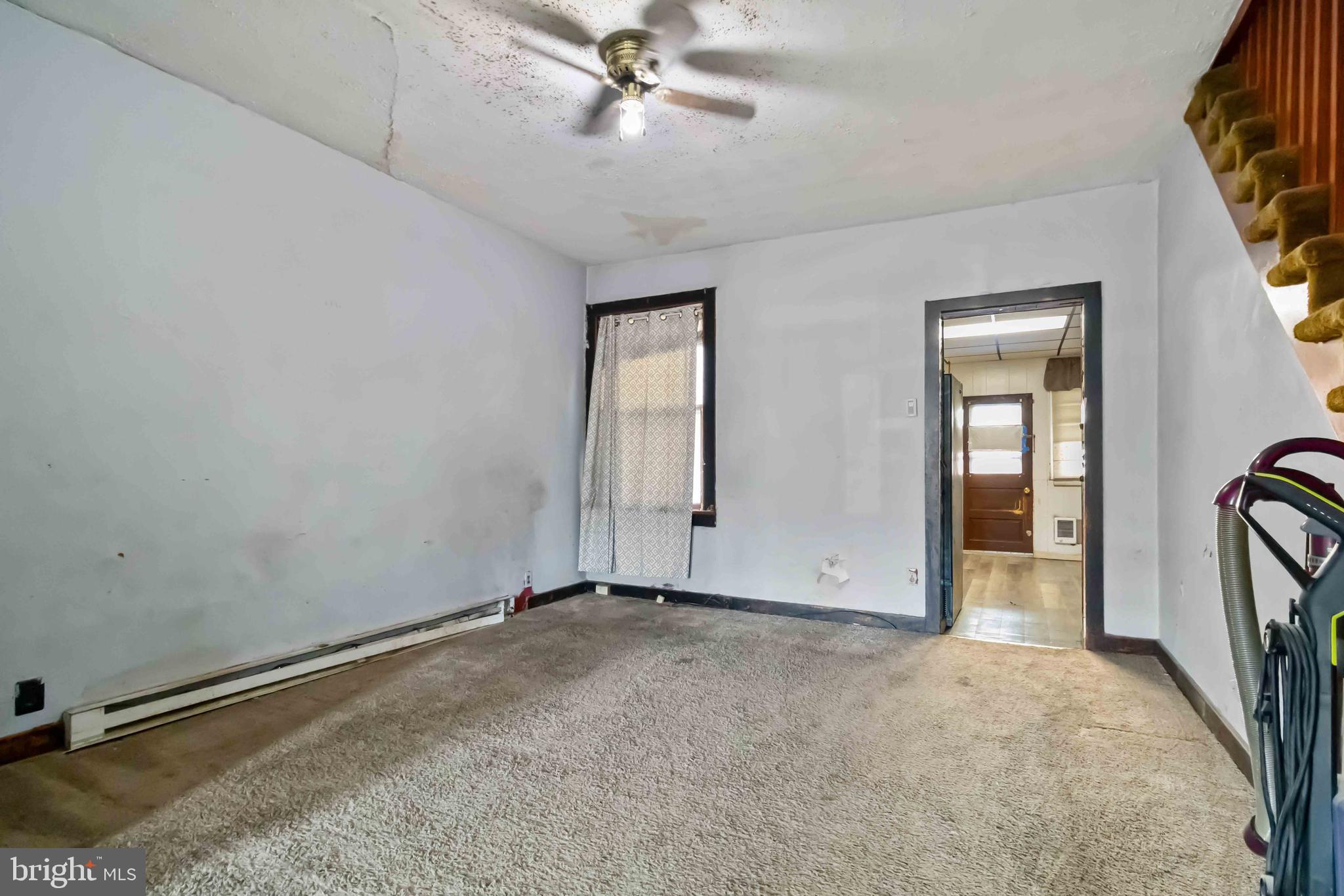 11 West Commerce Street Shamokin, PA 17872 - Photo 8 of 24 an empty room with fan and windows