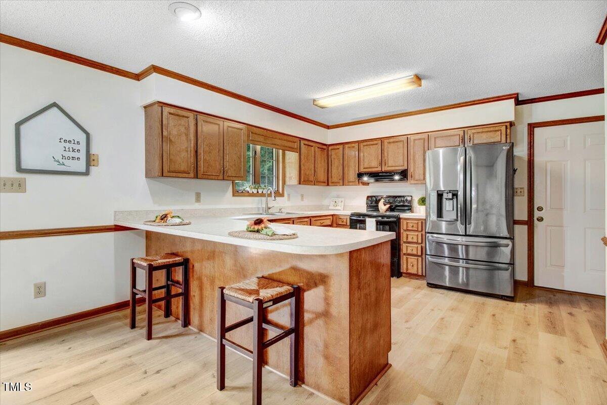 1860 Little Devine Road Selma, NC 27576 - Photo 12 of 46 Breakfast Bar & Kitchen