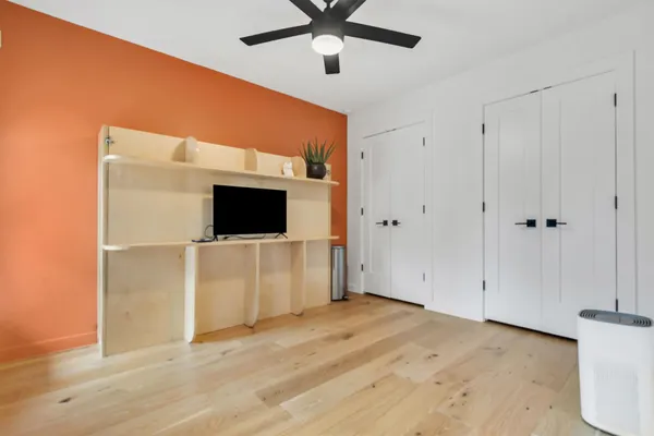 a view of a livingroom with wooden floor