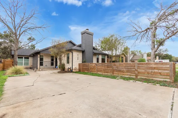 front view of a house with a street
