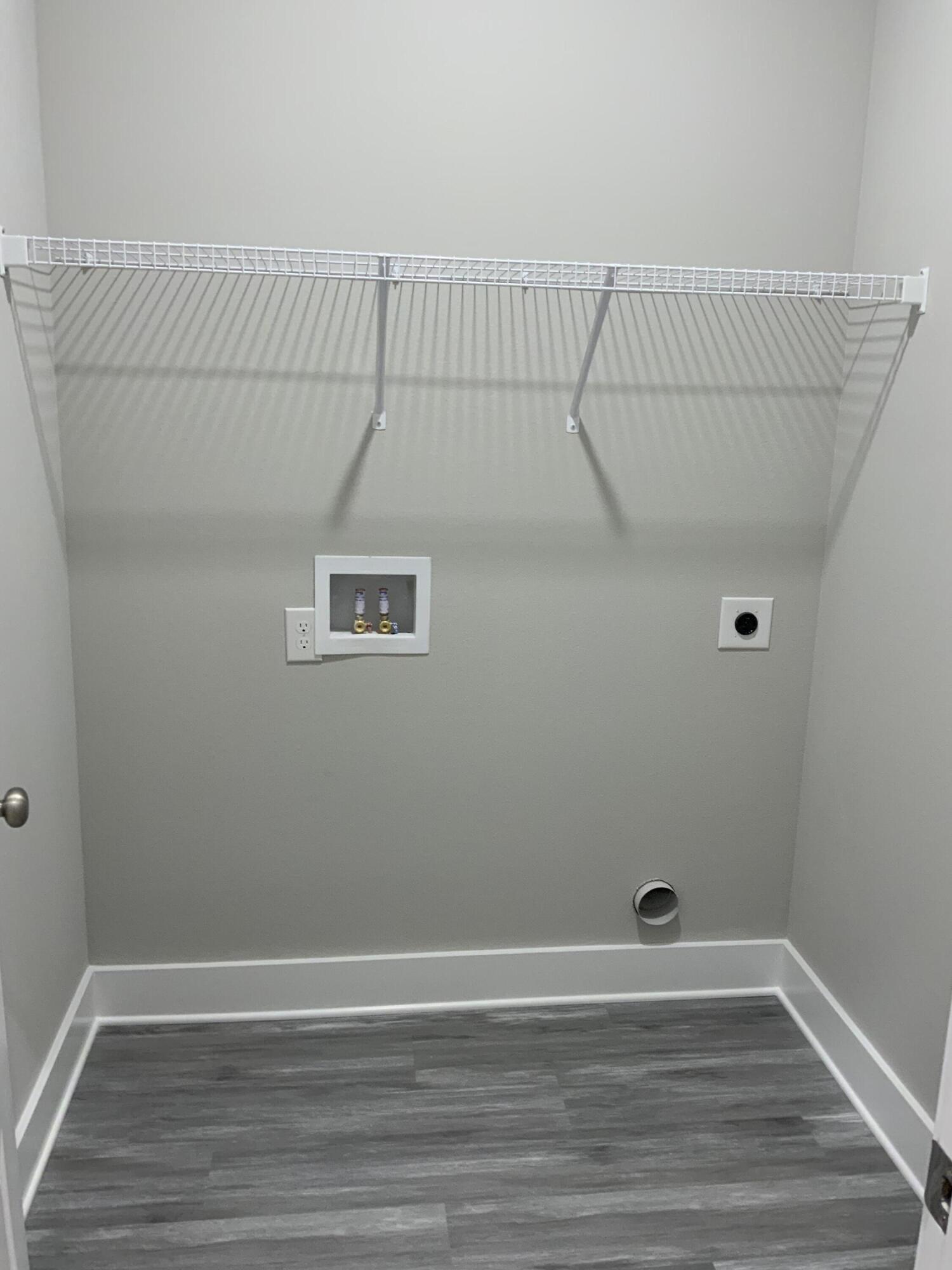 2800 Ram Lane Crestview, FL 32539 - Photo 15 of 20 a view of a room with wooden floor and white walls