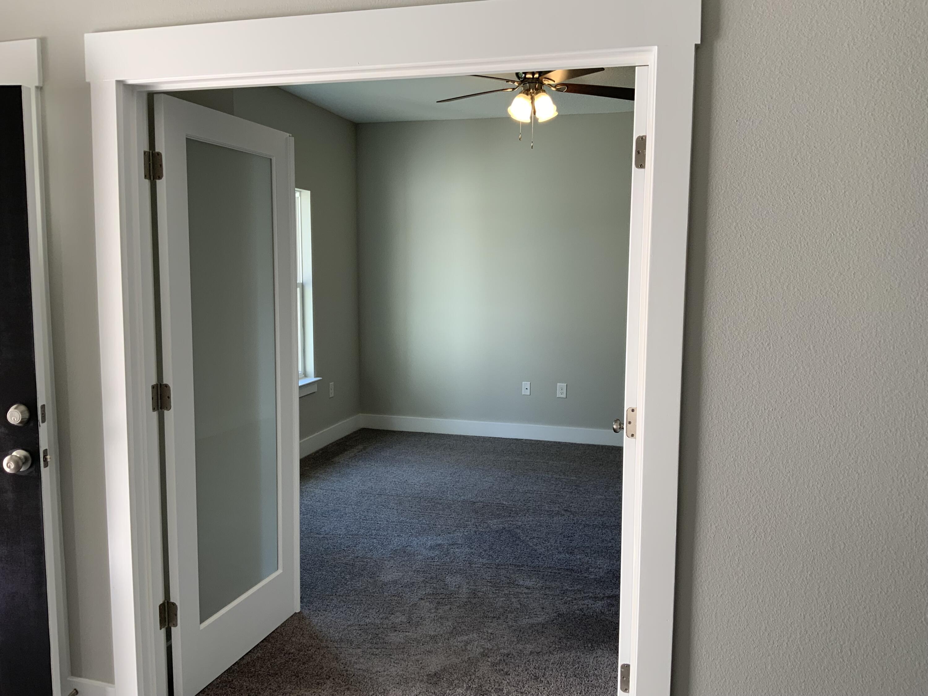 2800 Ram Lane Crestview, FL 32539 - Photo 9 of 20 an empty room with a mirror